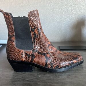 Sleek snakeskin booties